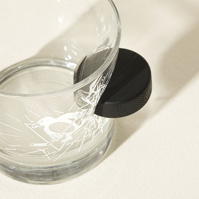 1121-off-the-glass-nhl-puck-rocks-glass-1.jpg