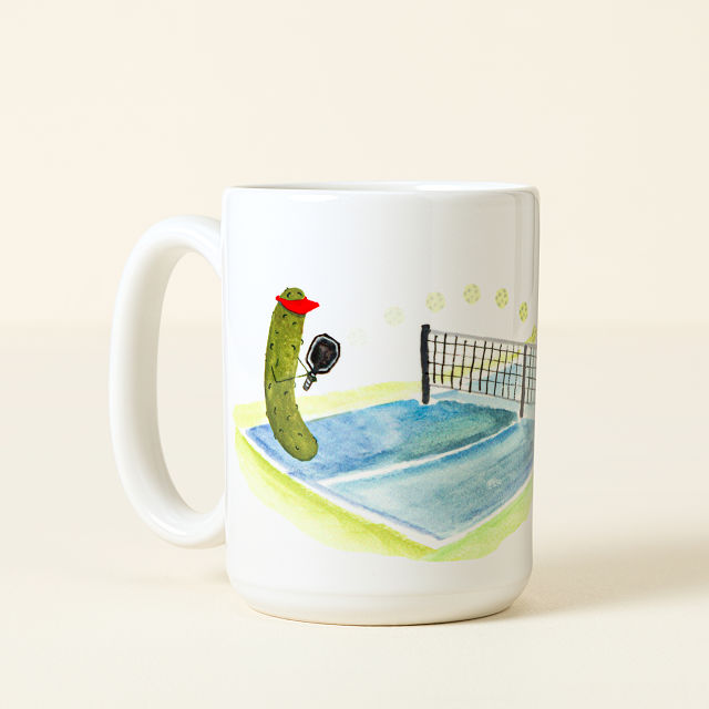 1346-pickles-playing-pickleball-mug-1.webp