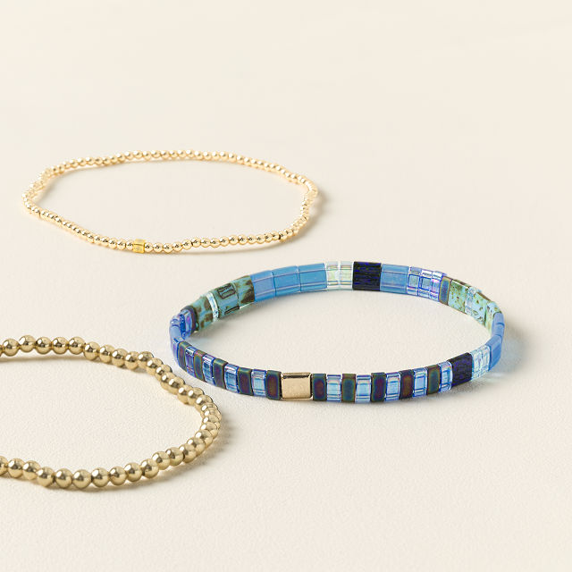 2009-be-you-morse-code-bracelet-stack-1.jpg
